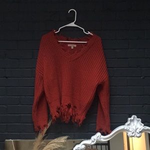 Red distressed sweater